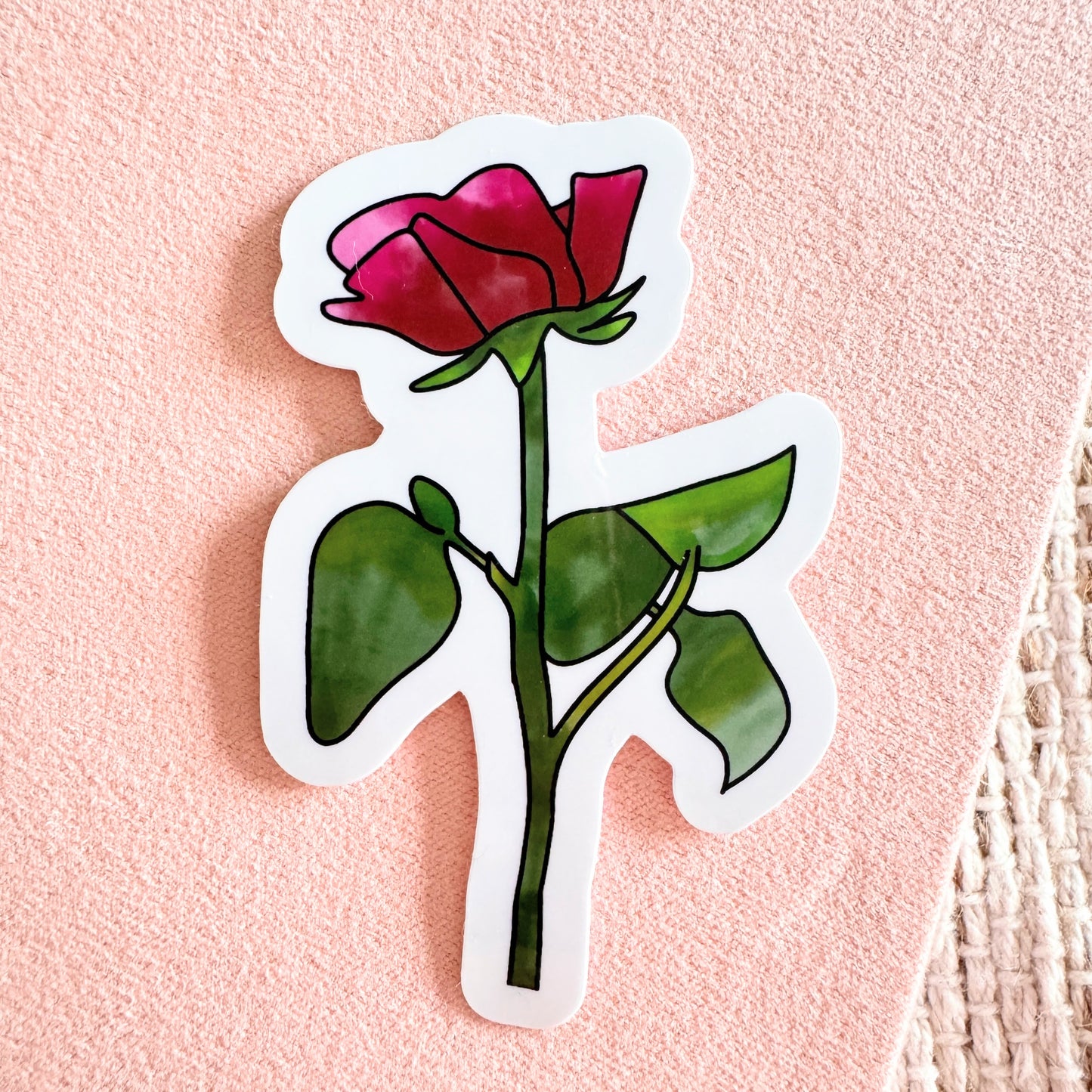 3-inch handmade sticker featuring a detailed, hand-drawn rose in vibrant colors. Laminated for water resistance, perfect for decorating water bottles, laptops, and journals. A beautiful and elegant design for flower lovers and sticker collectors.