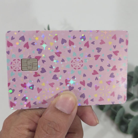 Showing the sparkle of the card sticker by moving it around in the light.