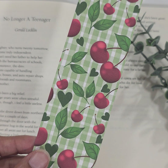 Green gingham bookmark with cherries pattern showing both sides. 